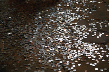 Lots of coins on the floor
