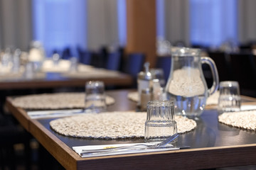 Empty dishes on the table in the restaurant