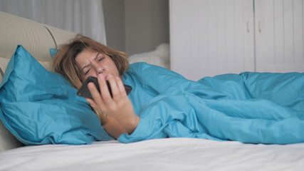 Really Sleeping Woman Wakes Up And Looks At The Phone Throws It And Falls Asleep
