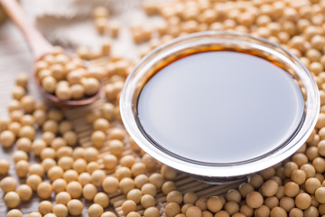Soy sauce and beans. Closeup.