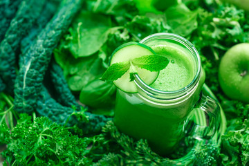 Fresh Organic Green Juice with Cucumber and Mint Garnish