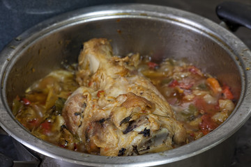 Pork knuckle cooked with vegetables