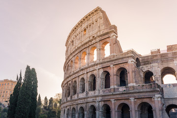 Naklejka na ściany i meble Colosseum in Rome and morning sun, Italy
