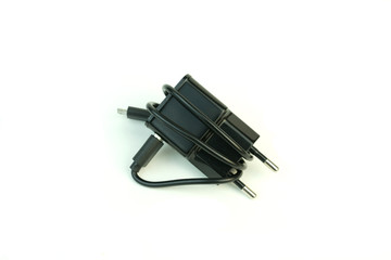 The charger for the phone. Photo on white background.