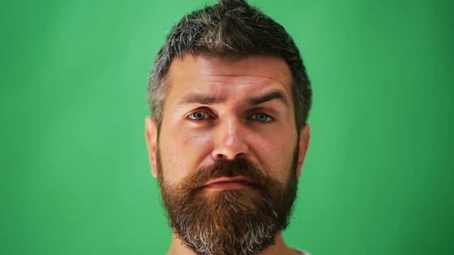 Male facial emotions. Bearded man with different expressions. Young man's portraits with different emotions and gestures. Handsome emotional man. Young man expressing different emotions.