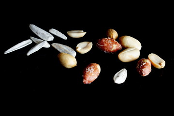 Peanuts and sunfloers seeds.