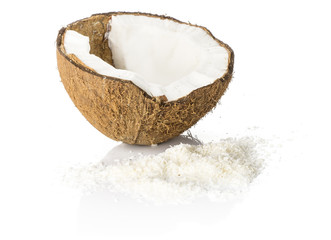 One coconut half with shavings isolated on white background brown fibrous shell with milk meat.