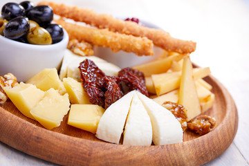cheese plate with olives