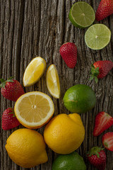 Fototapeta na wymiar lemons lime and berries