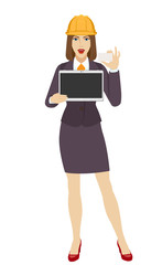 Businesswoman in construction helmet holding a digital tablet PC and showing business card