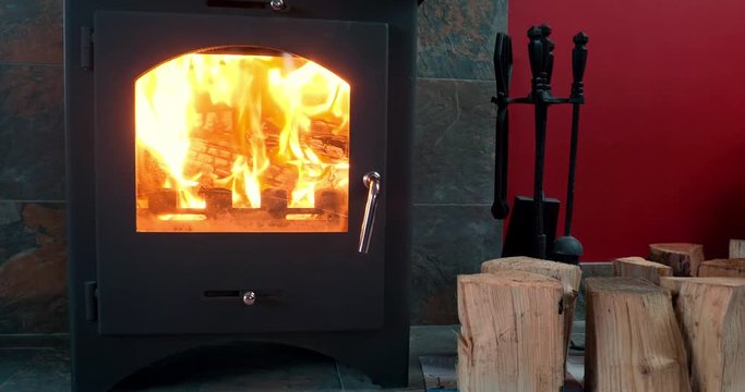 A close up of a log burning multi-fuel stove.
