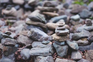 Fototapeta na wymiar Image of spiritual stones pyramid in the forest on Sakhalin island. Place of power