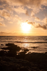 Fototapeta na wymiar Sunset on a beach in Monterey, California