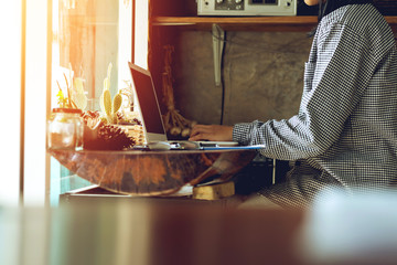 young girl working at home using computer