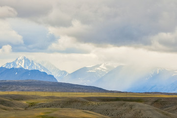 Fototapeta na wymiar Altai mountains landscape. Rainy, foggy mountain peaks