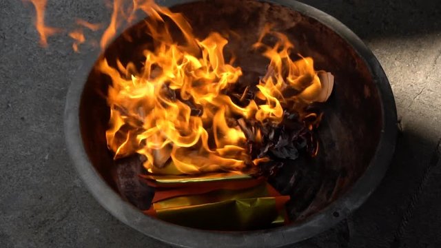 Burning joss paper for worship