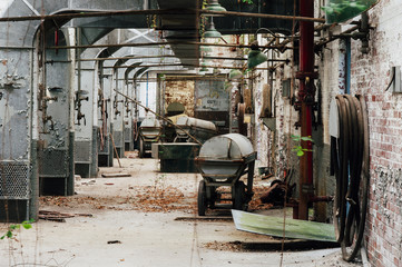 Fototapeta na wymiar Vintage Steel Carts / Coffins - Abandoned Indiana Army Ammunition Plant - Indiana