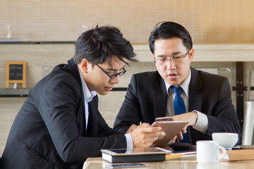 Young financial consultant presenting budget plan to client.a