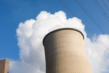 cooling tower with blue sky