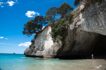 Washable wall murals Cathedral Cove Cathedral Cove - New Zealand - Girl on a rock