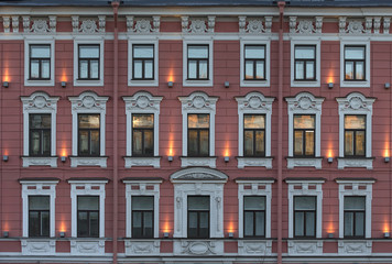 3855278 Fasade with windows of old multi-story building.