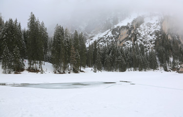 Pragser Wildsee also called Lake Braies with snow
