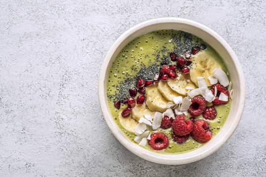 Smoothie in bowl with healthy additives