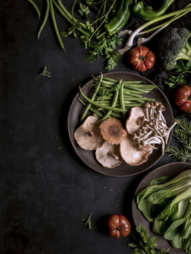Overhead view of vegetables on wooden table