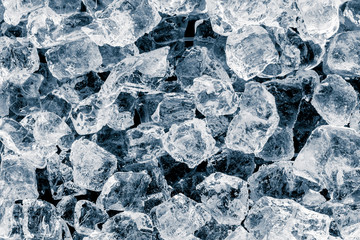Ice cubes on black background.