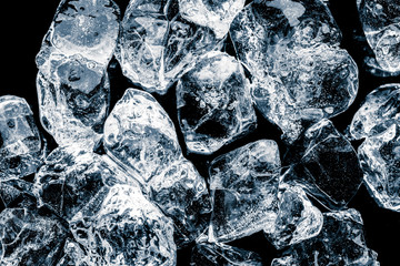 Ice cubes on black background.