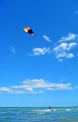 Young Man ride Kite Surf, Fun in the sea, Extreme Sport Kitesurfing or kiteboarding