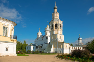 Fototapeta na wymiar Church of the Ascension and bell tower of Saviour Priluki Monastery by cloud day near Vologda, Russia.