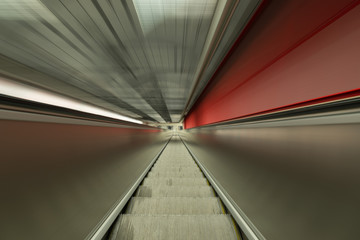 Moving up the escalator red