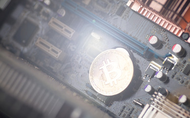 Bitcoin. Gold Bitcoin electronic computer processor board.