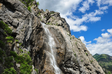 Waterfall on the rock. Named - Shirlak - Girl's tears . Altai, Siberia, Russia.