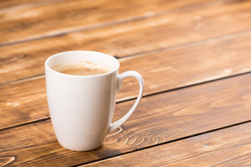 coffee cup on a wooden background