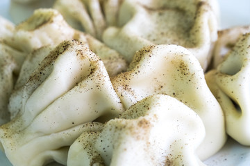 Khinkali - Georgian traditional food. Handmade rustic worldwide recipe book