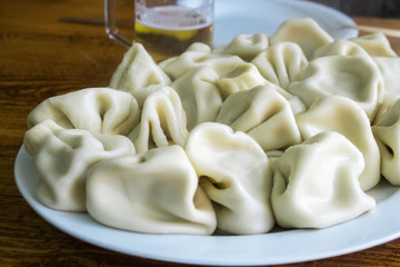 Khinkali - Georgian traditional food. Handmade rustic worldwide recipe book