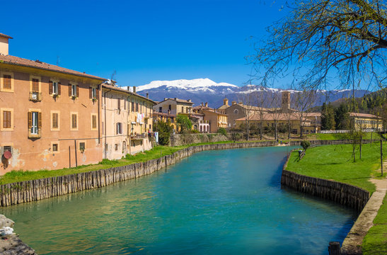 Rieti (Italy) - The historic center of the Sabina's provincial capital, under Mount Terminillo with snow and crossed by the river Velino.