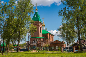 Fototapeta na wymiar Old church of Saint Nicholas in the village of Peredol, Russia 