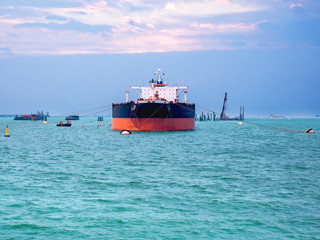 Mooring buoy operation assistance vessel tanker at sea.