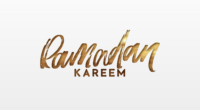 Ramadan Kareem. Text golden handwritten calligraphy. Lettering isolated on white background
