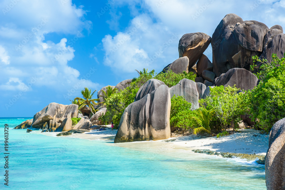 Wall mural source d'argent beach at island la digue, seychelles - beautifully shaped granite boulders and rock 