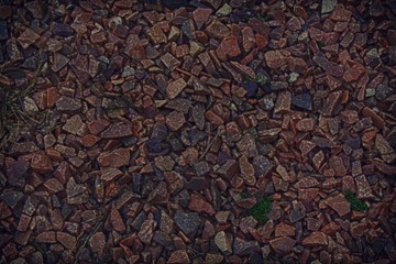Flintstone pebbles structure of red stone for background