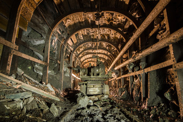 Fototapeta na wymiar Underground old ore gold mine tunnel shaft passage mining technology metal timbering