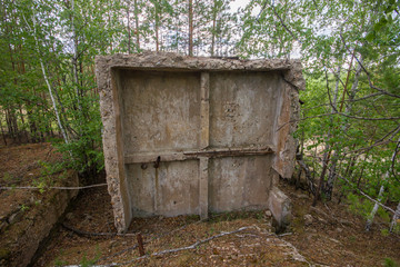Fototapeta premium Ruins decay of abandoned tungsten ore mine shaft mining technology