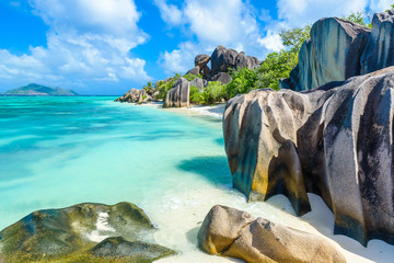 Source d'Argent Beach at island La Digue, Seychelles - Beautifully shaped granite boulders and rock formation - Paradise beach and tropical destination for vacation