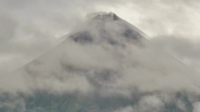 Mount Mayon Volcano in the province of Bicol, Philippines. Clouds Timelapse. Cloudy rain and cloudy weather.