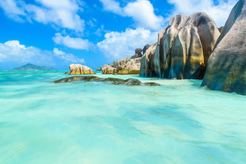 Source d'Argent Beach at island La Digue, Seychelles - Beautifully shaped granite boulders and rock formation - Paradise beach and tropical destination for vacation