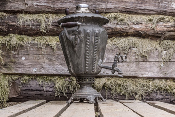 Russian traditional tea antique metal samovar. Souvenir.